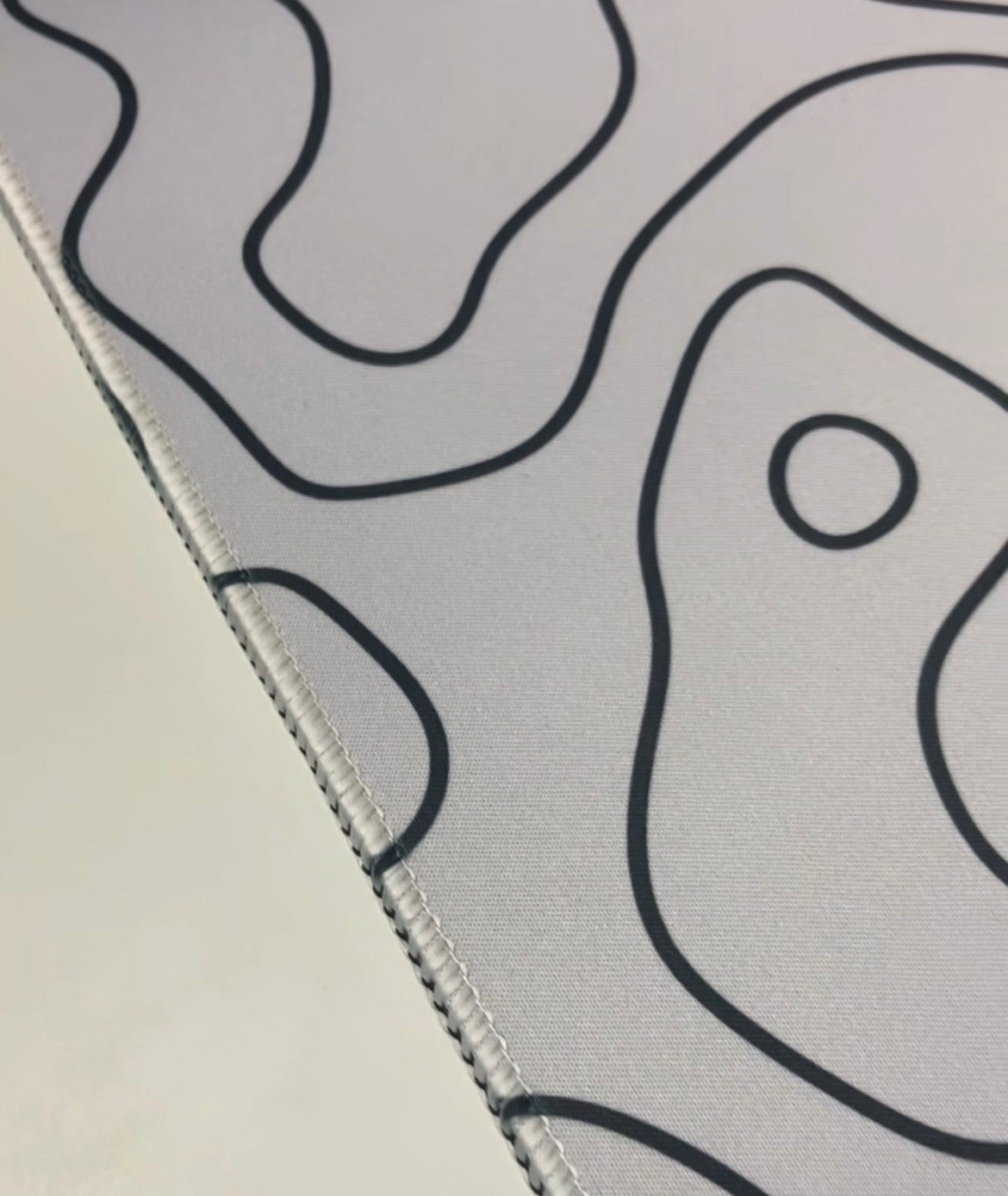 azurepads white topography deskpad high quality stitched edges close up